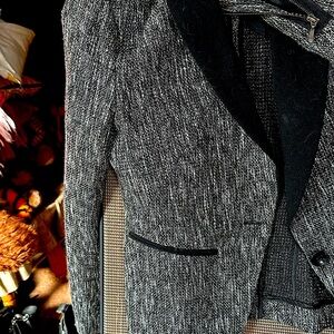 Tweed blazer with zippers at cuff
Black lapel never worn